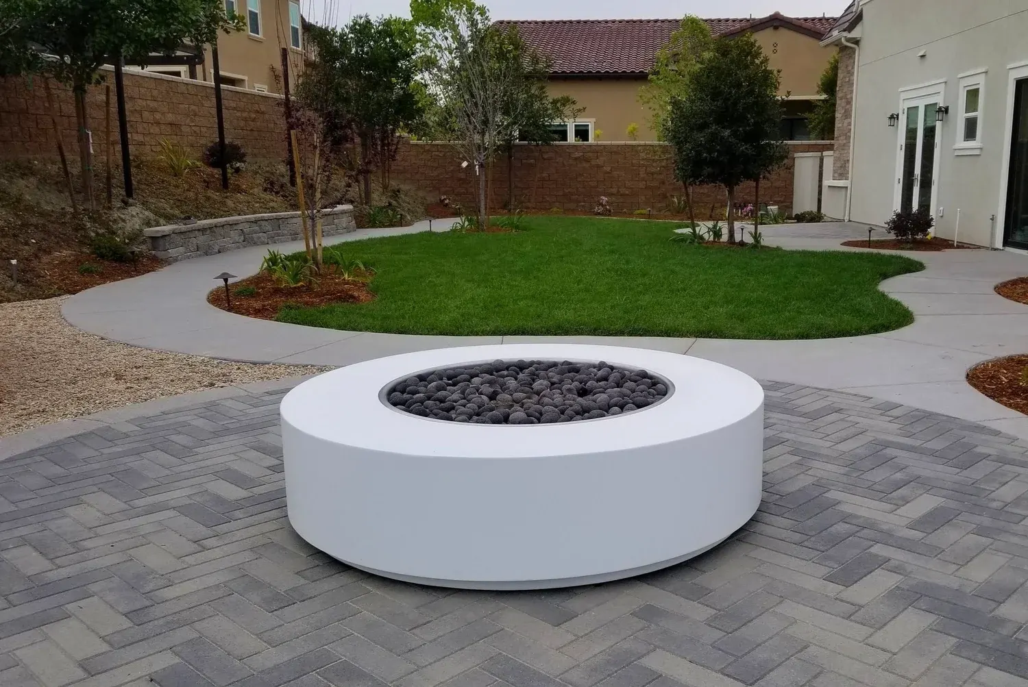 Outdoor gathering area with a fire feature