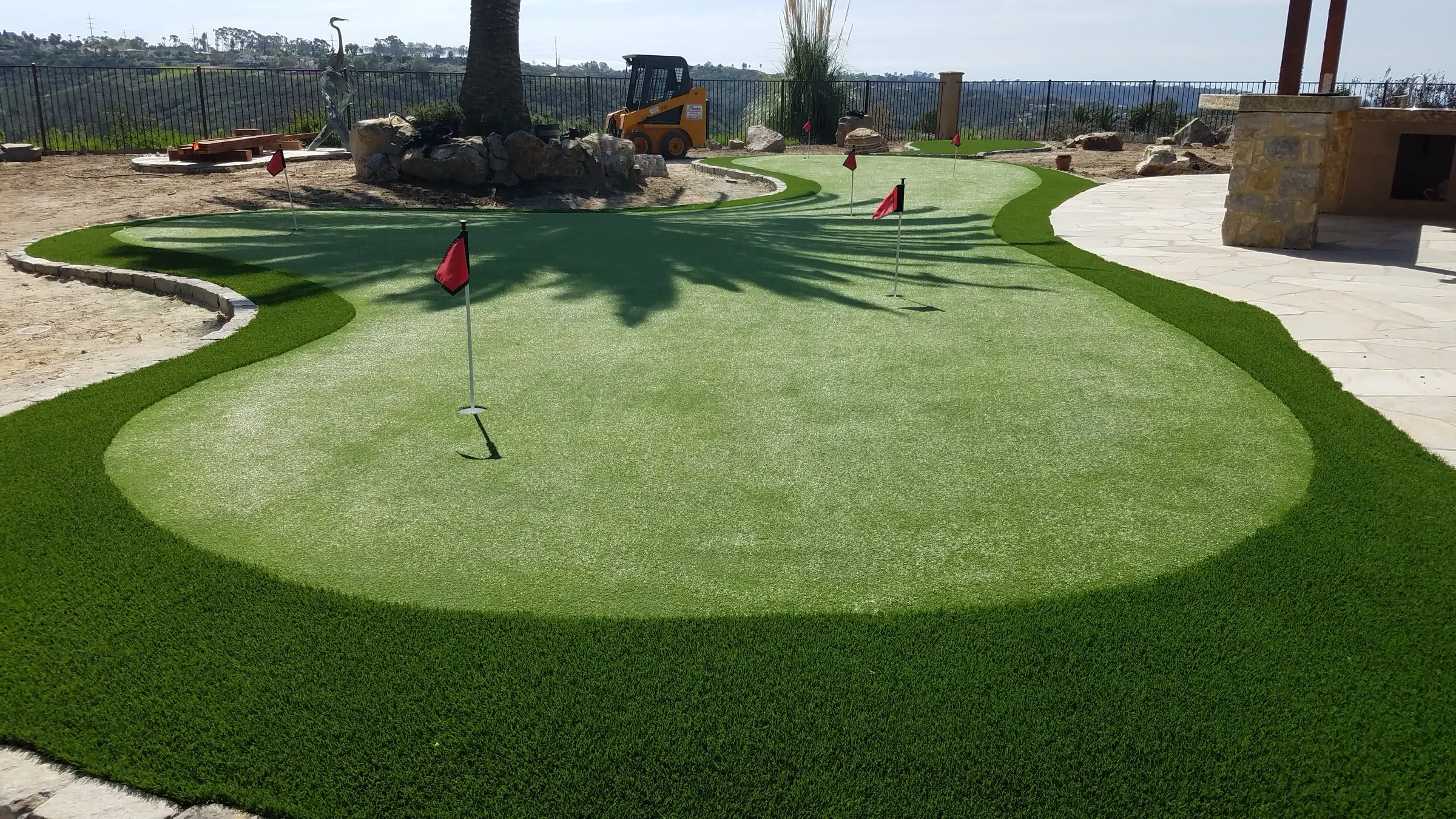 Backyard putting green with shaped contours